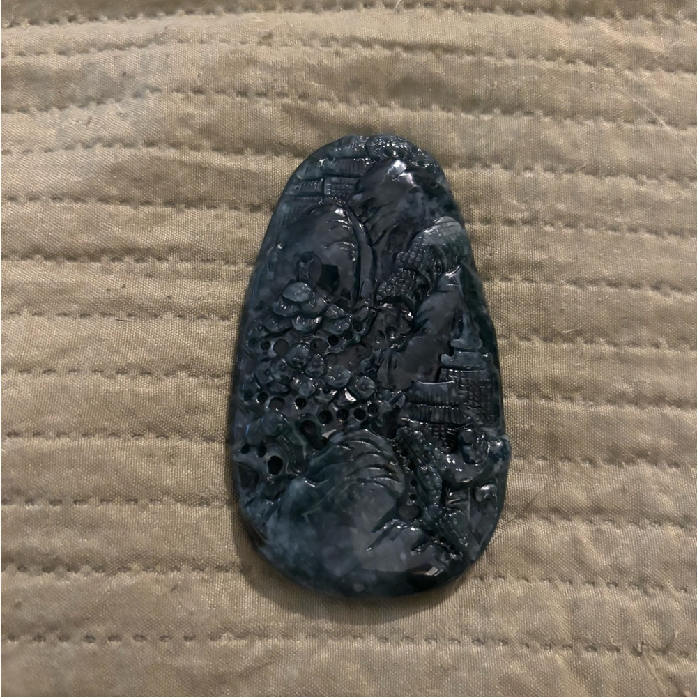 Intricately Carved Jade Pendant